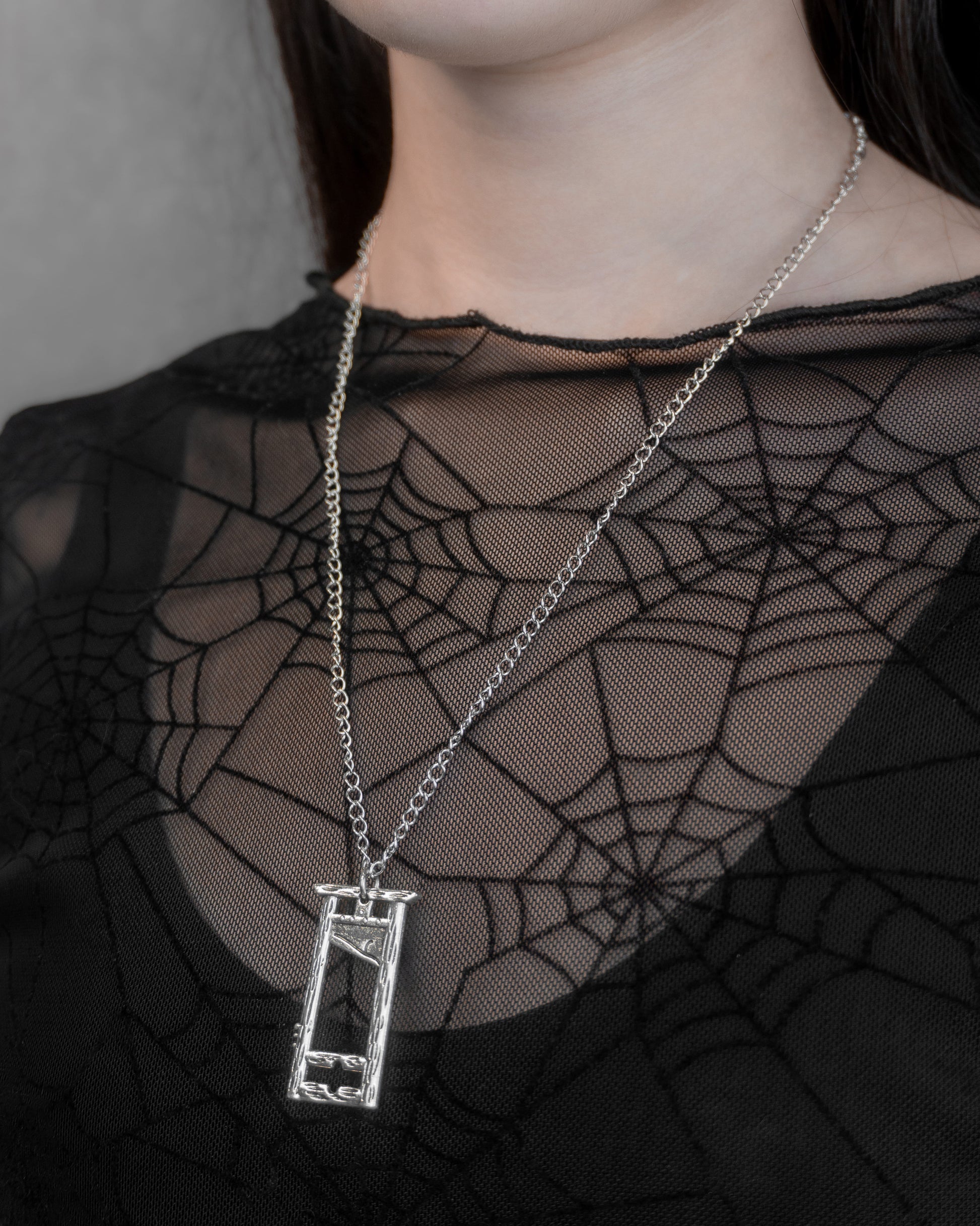 Guillotina | Aritos y Collar